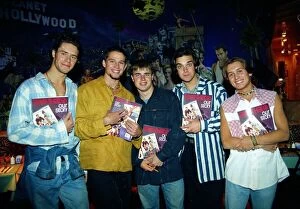 Images Dated 25th June 1993: Pop group take that holding copies of their new book beore signing them for fans at