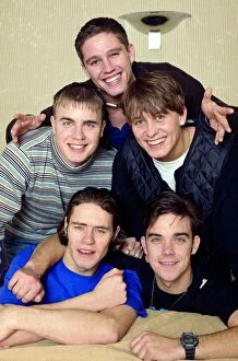 Images Dated 30th September 1993: Pop group Take That pose for a group photograph. Top to bottom: Jason Orange, Gary barlow