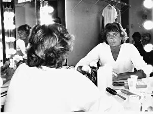 Pop singer Barry Manilow sitting at his dressing table following his concert at Bay Front