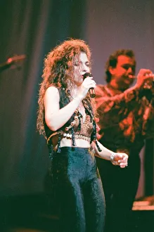 Images Dated 24th September 1989: Pop singer Gloria Estefan performing on stage during a concert in Britain 24th