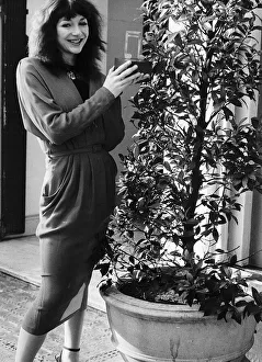 Pop singer Kate Bush with her Melody Maker Pop Award for Top Female Singer Pop singer Kate Bush with her Melody Maker Pop Award for Top Female Singer