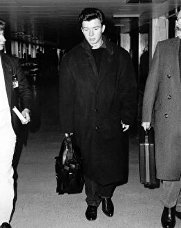 Images Dated 12th January 1988: Pop singer Rick Astley was at Heathrow Airport yesterday