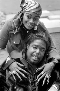 Pop star Barry White with his wife Goldean displaying her affections Pop star Barry White with his wife Goldean displaying her affections