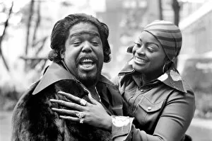 Images Dated 8th May 1975: Pop star Barry White with his wife Goldean displaying her affections