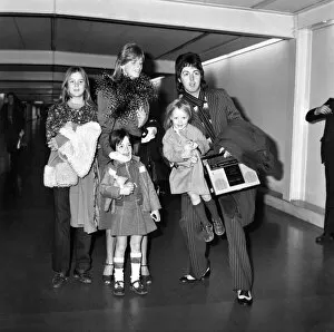Images Dated 10th January 1975: Pop star Paul McCartney and family. Carrying a portable radio