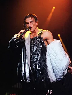 Pop star Peter Andre on stage at Concert Hall in Glasgow circa 1997 Pop star Peter Andre on stage at Concert Hall in Glasgow circa 1997