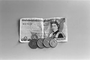 A five pound note and seventy five pence in change. 8th February 1988 A five pound note and seventy five pence in change. 8th February 1988