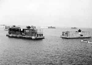 Pre-fabricated ports set down at Mulberry Harbour off the coast of Normandy built to aid Pre-fabricated ports set down at Mulberry Harbour off the coast of Normandy built to aid