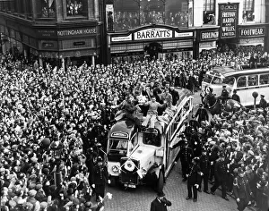 The Preston North End team arrive home in an open top bus The Preston North End team arrive home in an open top bus