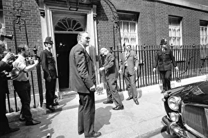 Images Dated 25th June 1970: Prime Minister Edward Heath is rushed back inside Number 10 Downing Street watched by