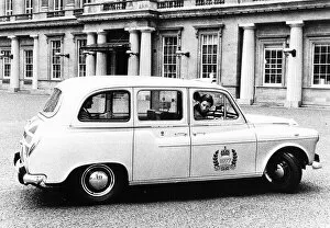 Prince Charles driving a London Taxi cab in May 1977 a special Silver Jubilee model