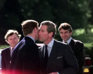 Prince Charles and the Duke Of York embrace June 1998 The two Princes kiss at Prince Charles and the Duke Of York embrace June 1998 The two Princes kiss at