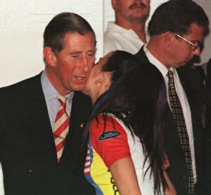 Images Dated 1st November 1997: Prince Charles gets a kiss from Spice Girl Mel C in Johannesburg