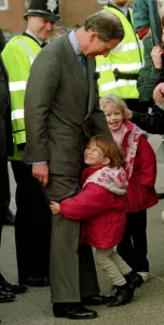 Prince Charles gets an unexpected hug from four year old Sarah Norris during a school Prince Charles gets an unexpected hug from four year old Sarah Norris during a school