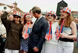 Images Dated 20th May 1997: Prince Charles is greeted by a group of local residents (dressed for the occasion