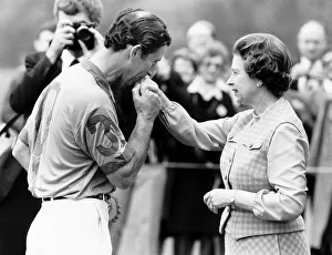 Prince Charles Kisses the hand of his mother Queen Elizabeth II after being presented Prince Charles Kisses the hand of his mother Queen Elizabeth II after being presented