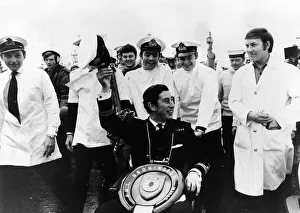 Prince Charles leaves the Navy for good in December 1976 with toilet seat round his Prince Charles leaves the Navy for good in December 1976 with toilet seat round his