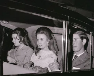 Images Dated 16th April 1970: Prince Charles with Lucia Santa Cruz (centre) in car on theie way to the Fortune Theatre