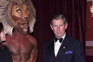 Images Dated 4th October 1999: Prince Charles October 1999 meets The Lion King actor Roger Wright at a charity