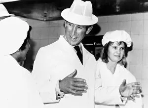 Images Dated 27th May 1988: Prince Charles opens a business training centre in white overalls and hat May 1988