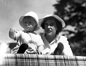 Prince Charles - The Prince of Wales aged 2, with his nurse Mabel Anderson watches a Prince Charles - The Prince of Wales aged 2, with his nurse Mabel Anderson watches a