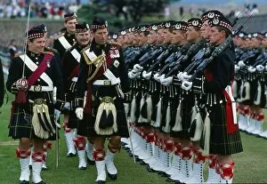 Prince Charles Prince of Wales inspecting troops with highland uniform / kilt at Fort