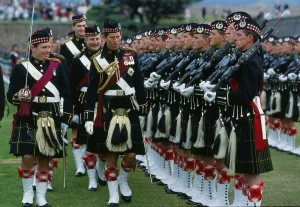 Prince Charles Prince of Wales inspecting troops with highland uniform / kilt at Fort Prince Charles Prince of Wales inspecting troops with highland uniform / kilt at Fort