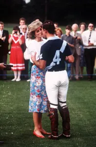 Prince Charles, Prince of Wales and Princess Diana, Princess of Wales kiss as they attend Prince Charles, Prince of Wales and Princess Diana, Princess of Wales kiss as they attend