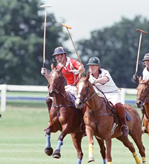 Images Dated 16th July 1991: Prince Charles (Red shirt wearing number 3) was locked in a fierce battle with Princess