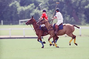 Images Dated 16th July 1991: Prince Charles (Red shirt wearing number 3) was locked in a fierce battle with Princess
