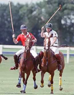 Images Dated 16th July 1991: Prince Charles (Red shirt wearing number 3) was locked in a fierce battle with Princess