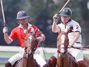 Images Dated 16th July 1991: Prince Charles (Red shirt wearing number 3) was locked in a fierce battle with Princess