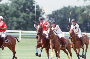 Images Dated 16th July 1991: Prince Charles (Red shirt wearing number 3) was locked in a fierce battle with Princess