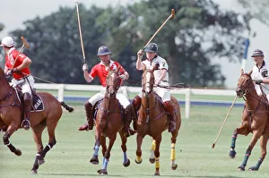 Images Dated 16th July 1991: Prince Charles (Red shirt wearing number 3) was locked in a fierce battle with Princess