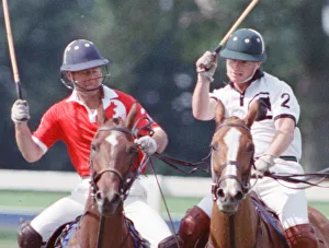 Images Dated 16th July 1991: Prince Charles (Red shirt wearing number 3) was locked in a fierce battle with Princess