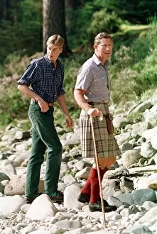 Images Dated 12th August 1997: Prince Charles with sons at Balmoral August 1997 Prince William posed on the banks
