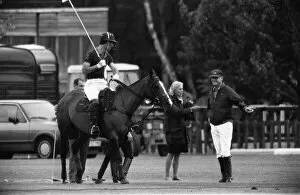 Images Dated 25th May 1988: Prince Charles taking a few last pre match tips from his polo coach Major Ronald Ferguson