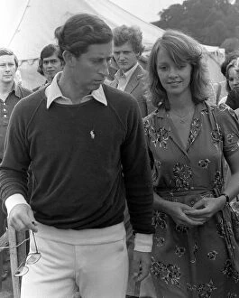 Images Dated 3rd August 1979: Prince Charles walks along with Sabrina Guinness at polo match at Cowday Park