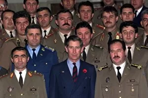 Images Dated 6th November 1998: Prince Charles wearing a blue suit with poppy stands among officers
