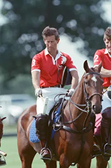 Images Dated 16th July 1991: Prince Charles (wearing number 3) was locked in a fierce battle with Princess Diana'