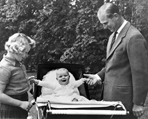 Duke Of Edinburgh Gallery: PRINCE GEORGE LOOKS LIKE PRINCE ANDREW AS A BABY. Prince Andrew laughs while sitting in