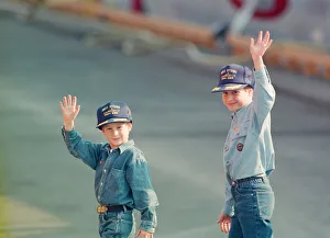 Prince Harry (left) and Prince William (right) wave to the cameras during their tour of Prince Harry (left) and Prince William (right) wave to the cameras during their tour of