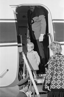 Images Dated 14th September 1986: Prince Harry and his mother Princess Diana, arrive at Heathrow Airport, London