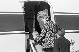 Images Dated 14th September 1986: Prince Harry and his mother Princess Diana, arrive at Heathrow Airport, London