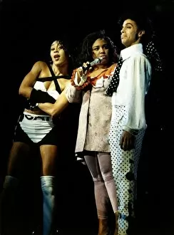 Images Dated 25th July 1988: Prince Musician Pop Star on stage performing with backing singers