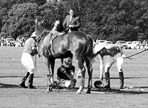 Prince Philip crouches beneath his Horse Lightening after he colided with three others Prince Philip crouches beneath his Horse Lightening after he colided with three others
