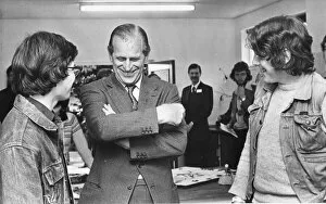 Prince Philip, Duke of Edinburgh, shares a joke with youngsters to the Eskdale Outward