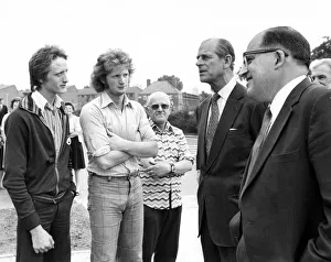Prince Philip, Duke of Edinburgh stops to have a joke with Castle Irwell gardeners with a Prince Philip, Duke of Edinburgh stops to have a joke with Castle Irwell gardeners with a