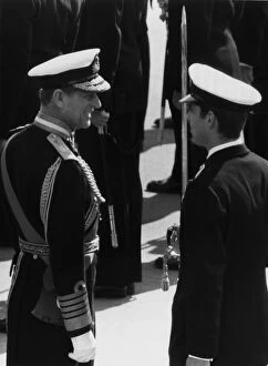Images Dated 3rd April 1980: Prince Philip, Duke of Edinburgh talks to his son Prince Andrew during the Queen
