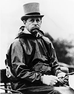 Prince Philip shows what he thinks of the weather. 17th May 1978 Prince Philip shows what he thinks of the weather. 17th May 1978